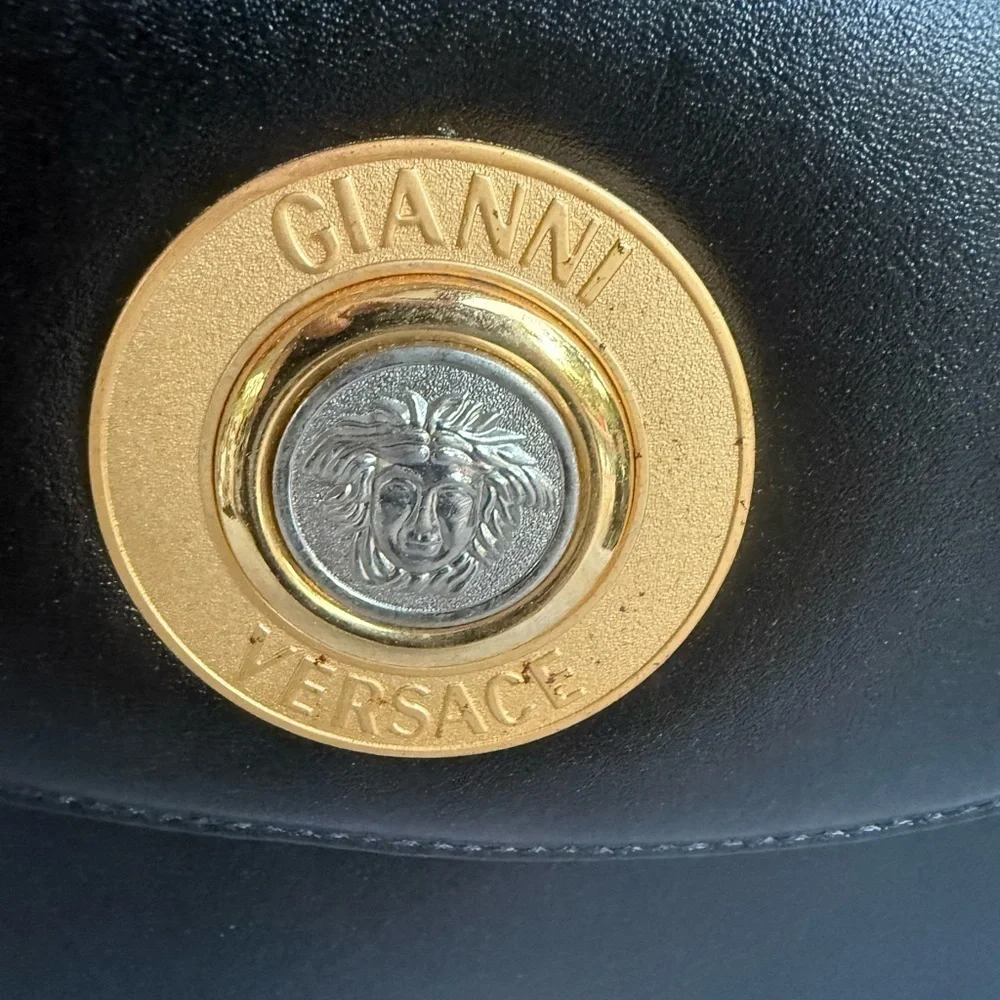 Versace Black and Gold Shoulder Bag with Classic Design